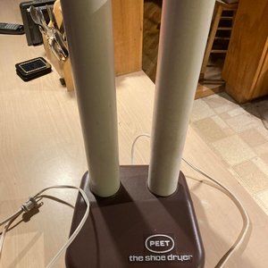 Peet Boot Dryer thermal convection to safely dry soggy footwear overnight.